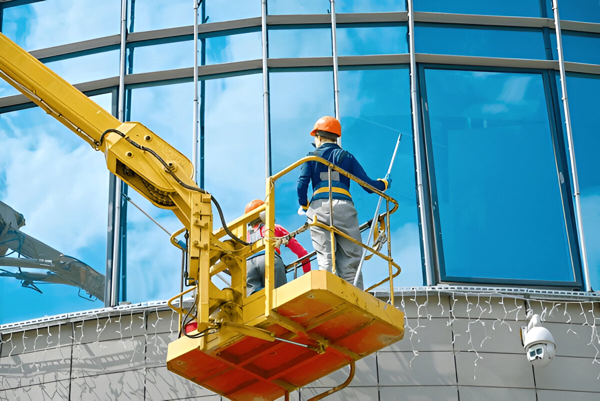 Facade cleaning crew at commercial building site